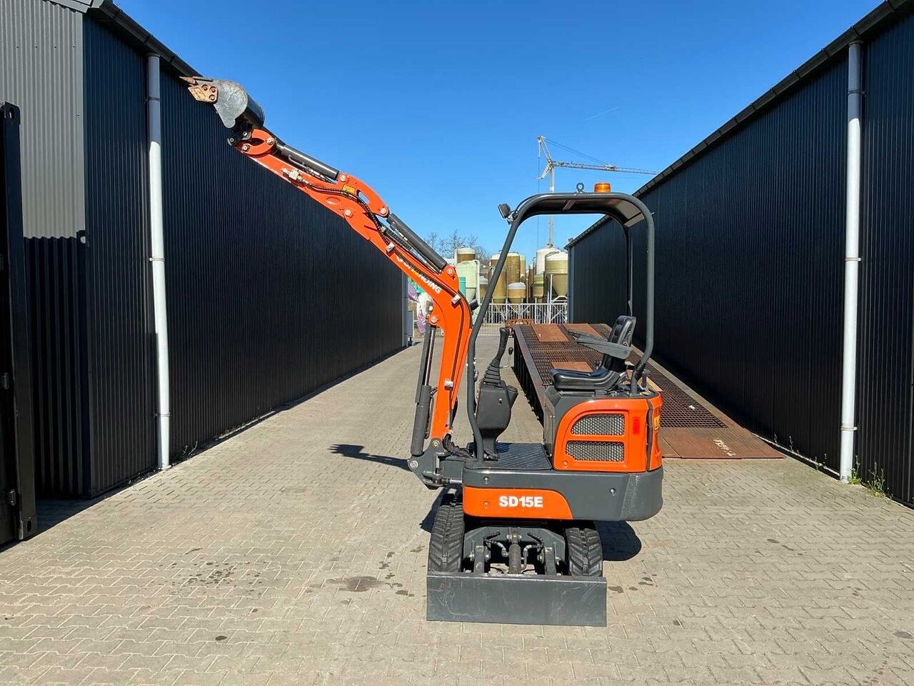 Kubota SD15E mini excavator, rear three-quarter view