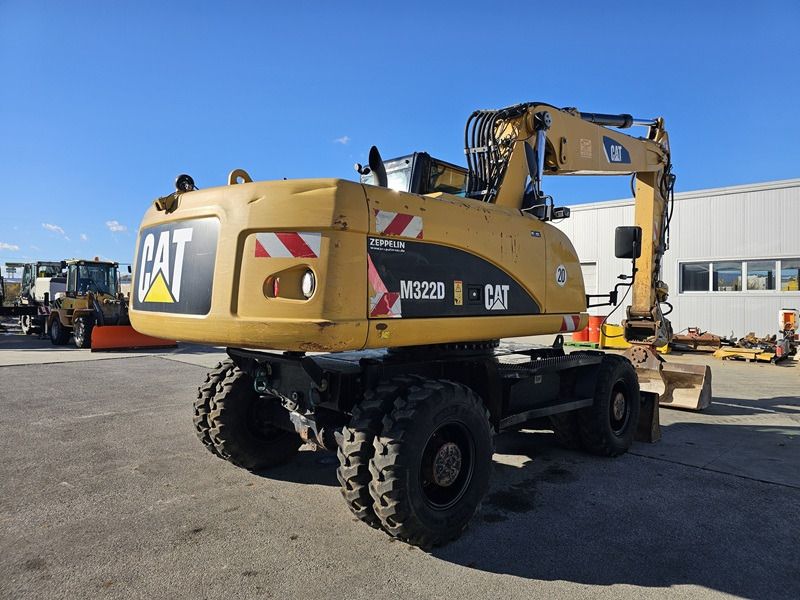 2011 Caterpillar M322D wheel excavator rear three-quarter view 2011 Caterpillar M322D wheel excavator rear three-quarter view