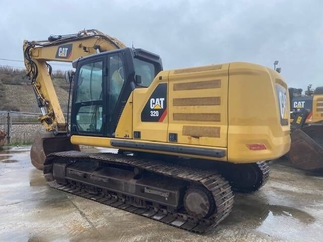 2018 Caterpillar 320 crawler excavator, rear three-quarter view 2018 Caterpillar 320 crawler excavator, rear three-quarter view