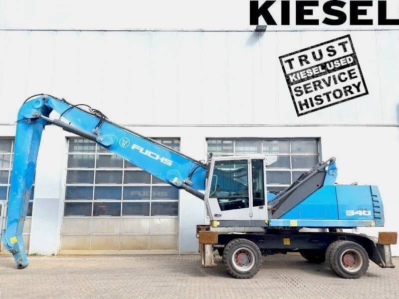 2015 Fuchs MHL340 E material handler, side profile view