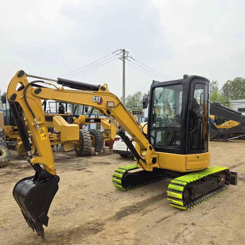2023 Caterpillar 303.5E mini excavator, side view 2023 Caterpillar 303.5E mini excavator, side view