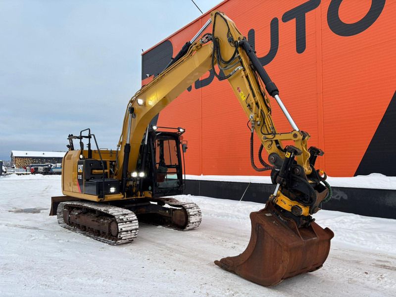 2015 Caterpillar 312 EL crawler excavator, side view 2015 Caterpillar 312 EL crawler excavator, side view