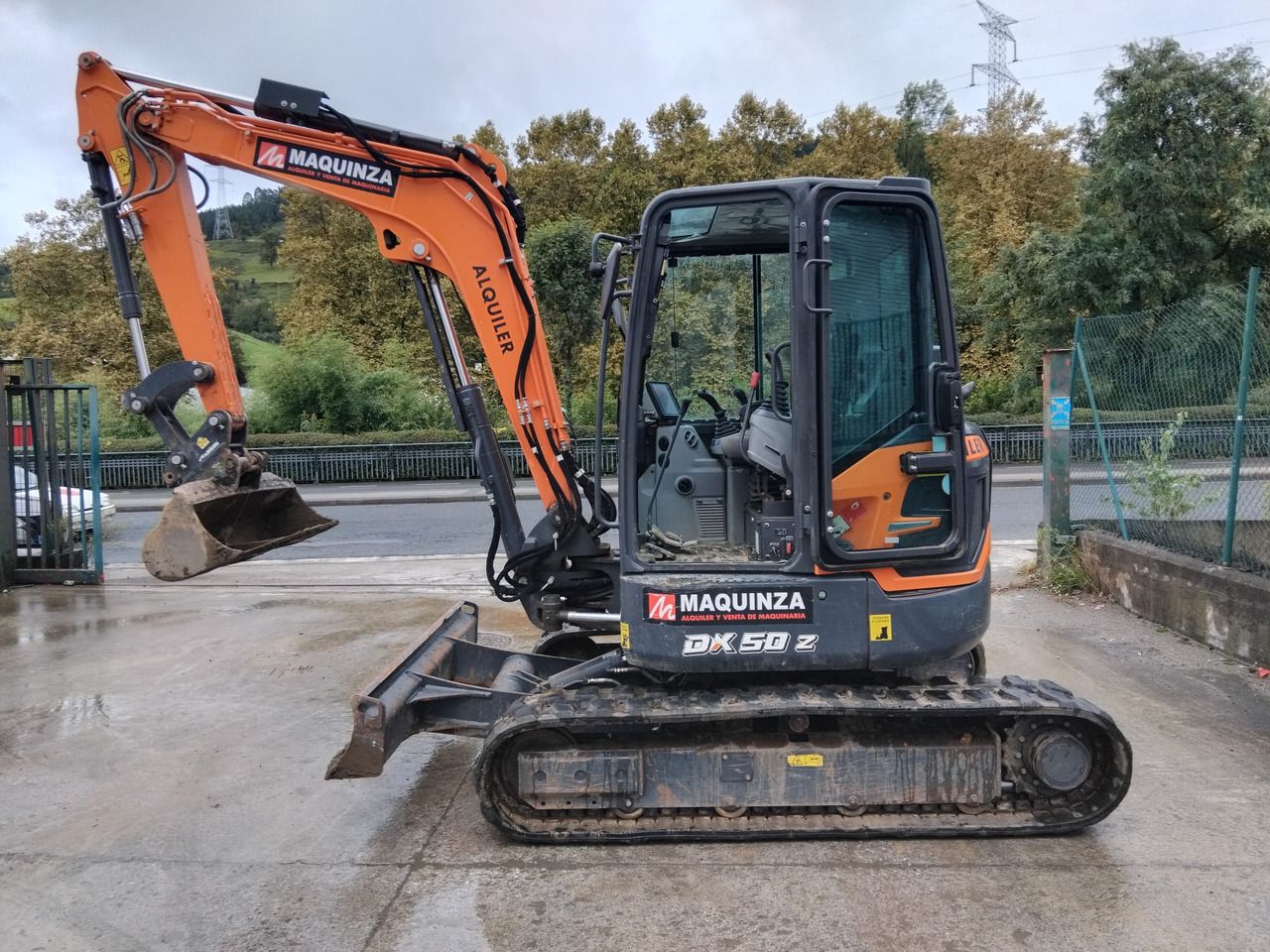 2023 Develon DX50Z-7 mini excavator, side view 2023 Develon DX50Z-7 mini excavator, side view