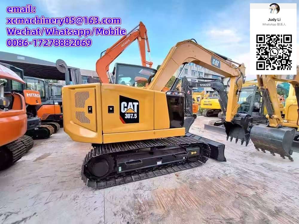2024 Caterpillar 307.5 excavator, rear three-quarter view