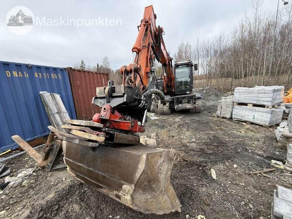 2014 Hitachi ZX140W-5 wheel excavator, front three-quarter view