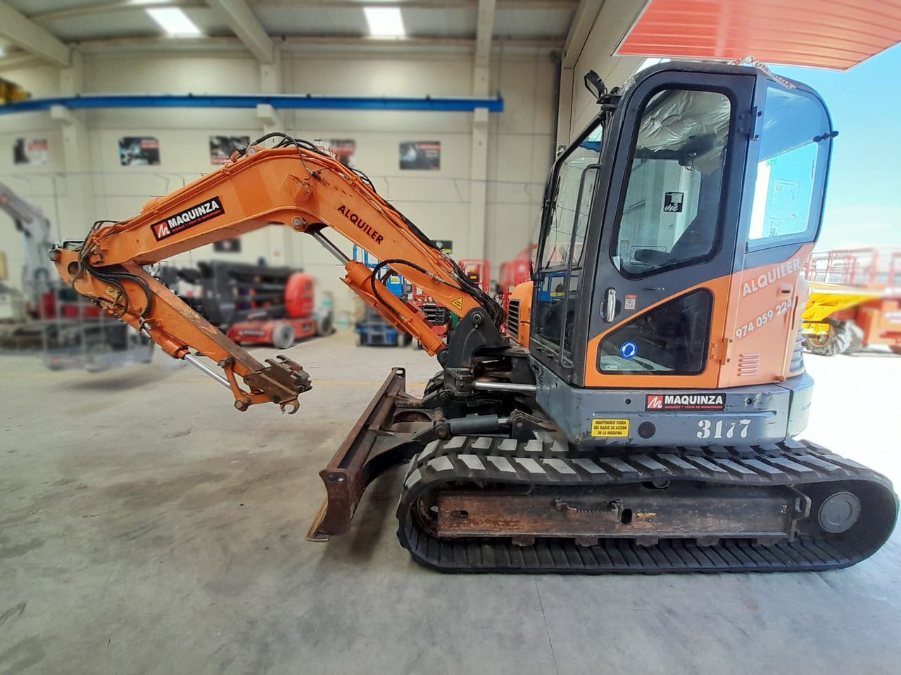 2015 Develon DX85R-7 mini excavator, side profile view 2015 Develon DX85R-7 mini excavator, side profile view
