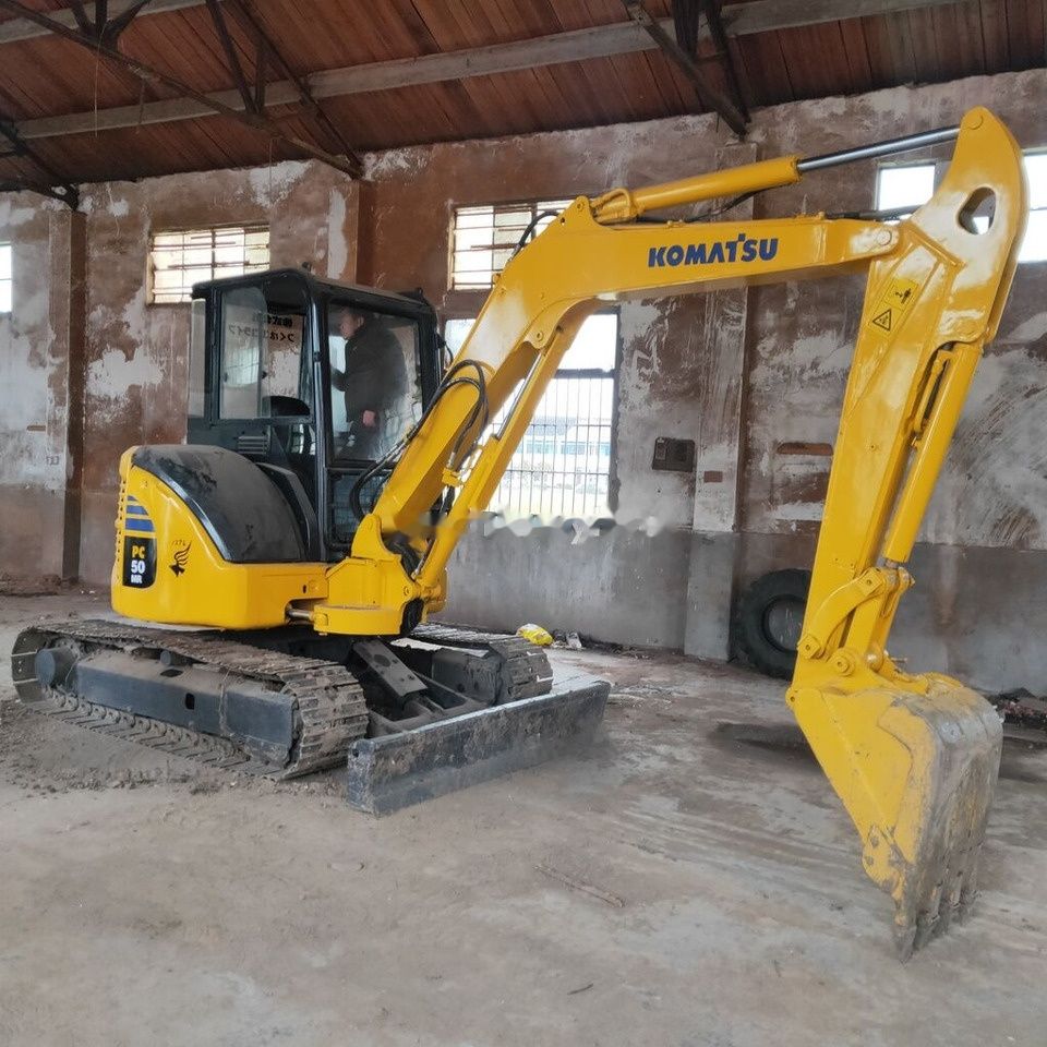Komatsu PC50MR mini excavator, side view Komatsu PC50MR mini excavator, side view