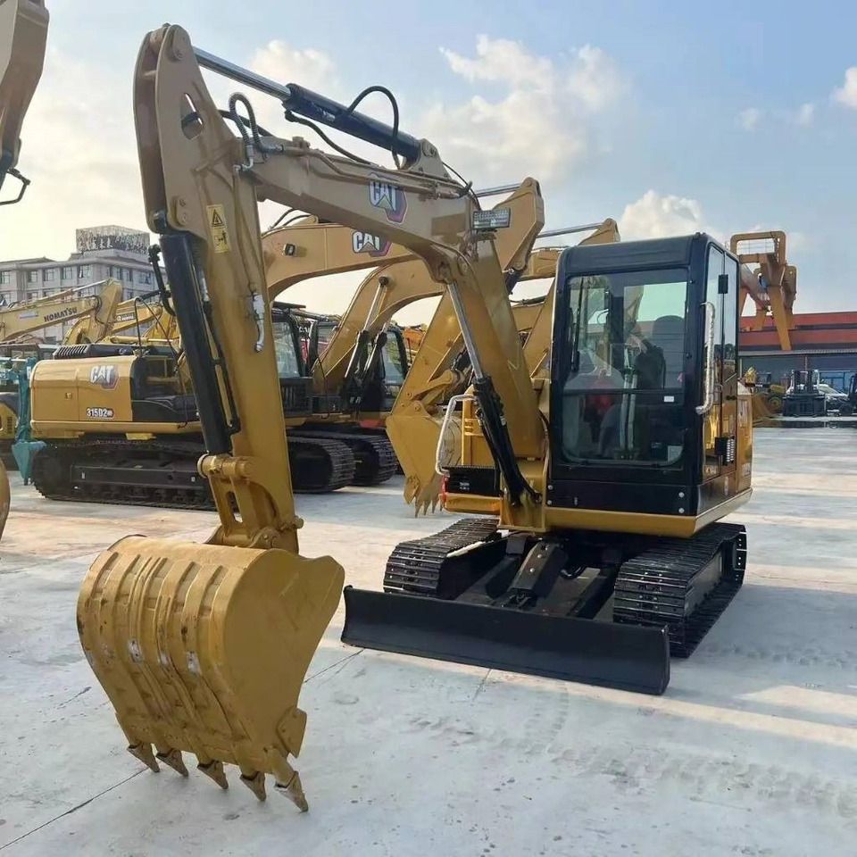 2023 Caterpillar 306E2 mini excavator, front three-quarter view 2023 Caterpillar 306E2 mini excavator, front three-quarter view