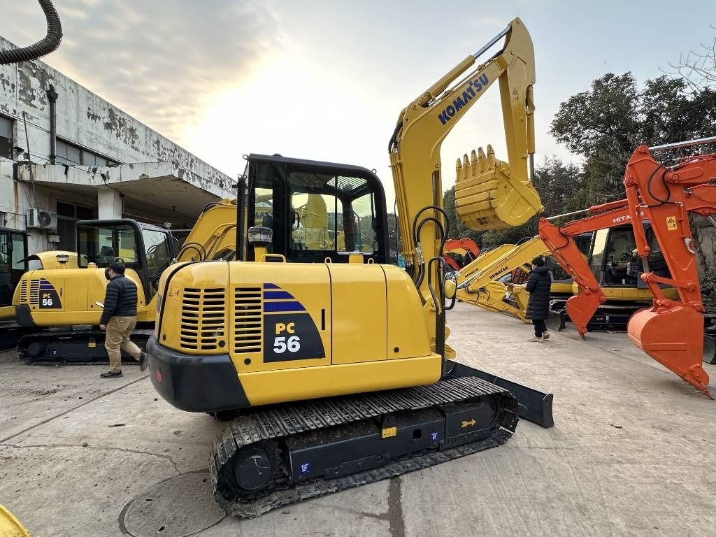 2022 Komatsu PC56-7 mini excavator, rear three-quarter view 2022 Komatsu PC56-7 mini excavator, rear three-quarter view