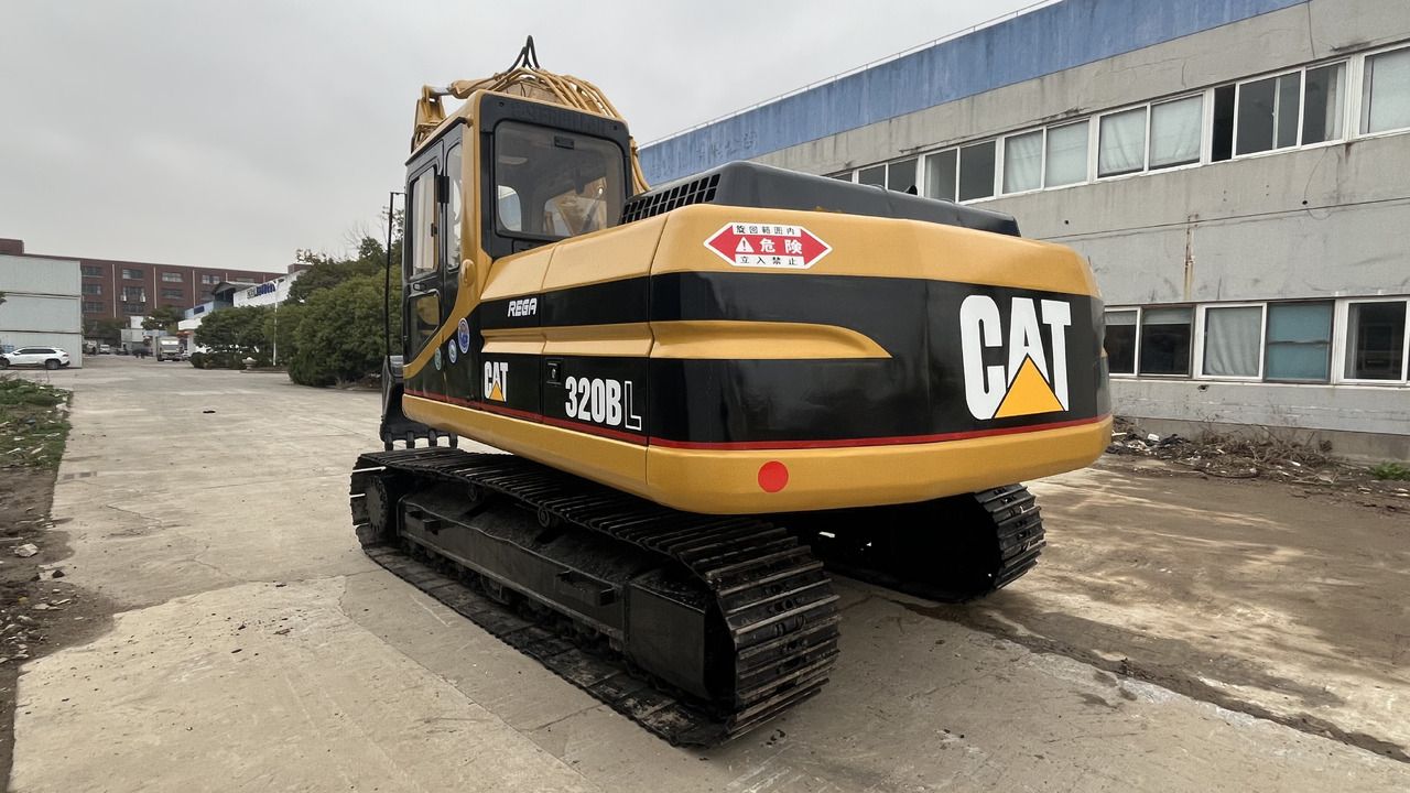 2019 Caterpillar 320BL crawler excavator, rear three-quarter view