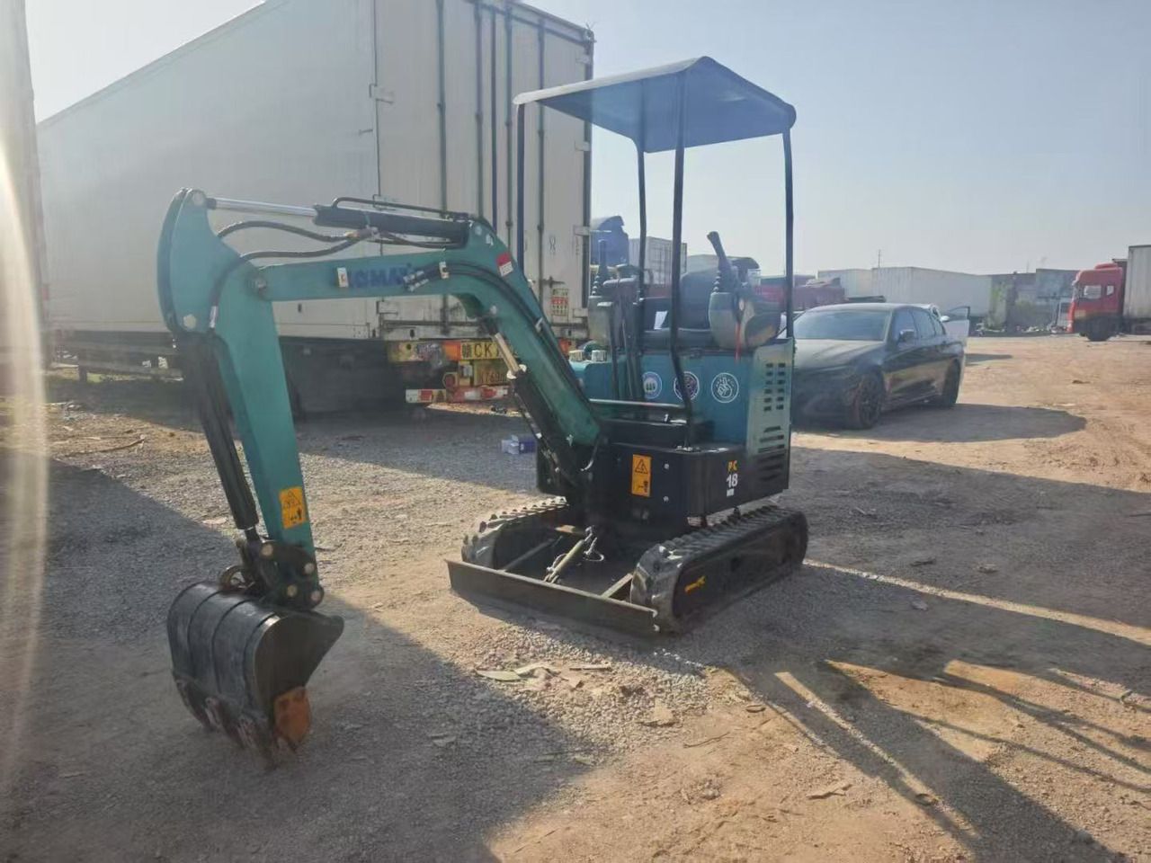 2023 Komatsu PC18 mini excavator, front three-quarter view 2023 Komatsu PC18 mini excavator, front three-quarter view