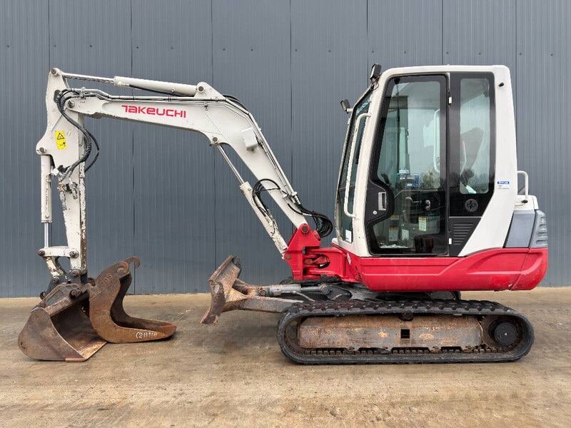 2010 Takeuchi TB235 mini excavator side view 2010 Takeuchi TB235 mini excavator side view