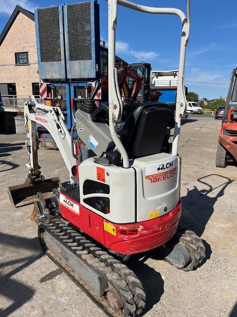2023 Takeuchi TB210R mini excavator, rear three-quarter view 2023 Takeuchi TB210R mini excavator, rear three-quarter view