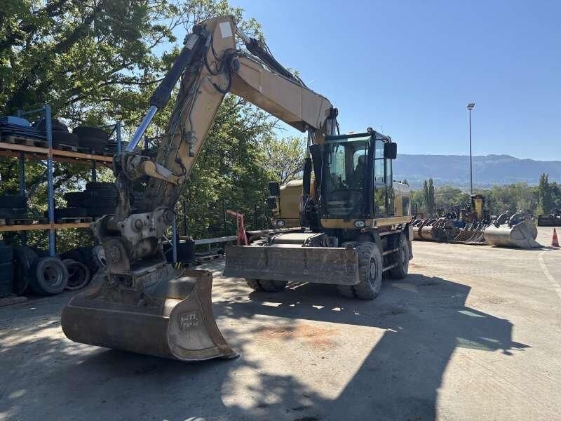 2014 Caterpillar M318D wheel excavator, front three-quarter view 2014 Caterpillar M318D wheel excavator, front three-quarter view