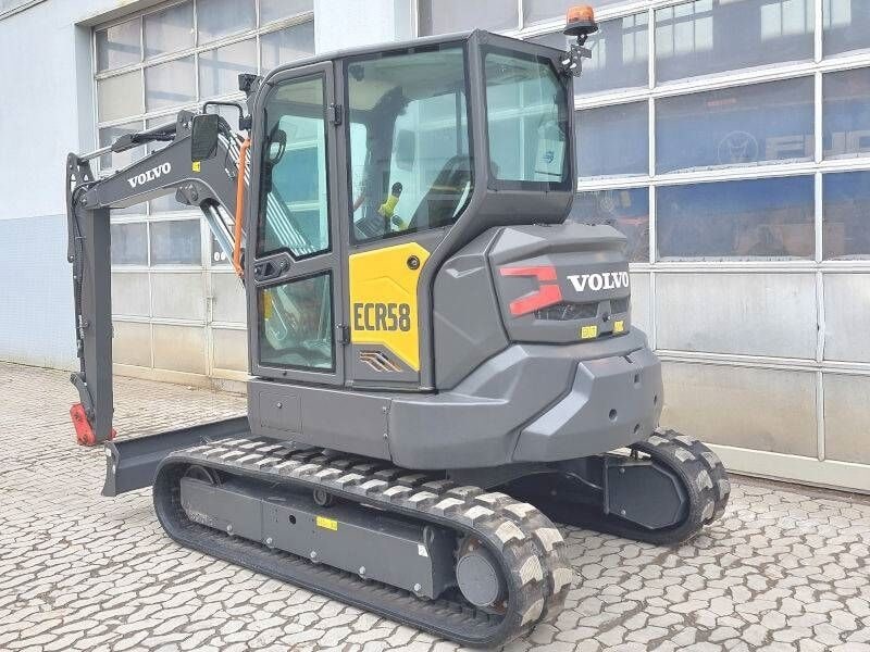 2023 Volvo ECR58F mini excavator, rear three-quarter view