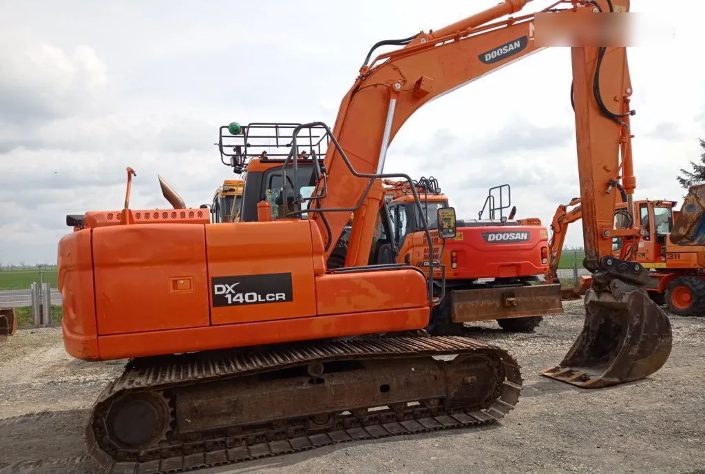 2014 Doosan DX140LCR crawler excavator, rear three-quarter view