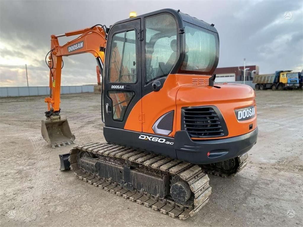 2021 Doosan DX60C mini excavator, rear three-quarter view