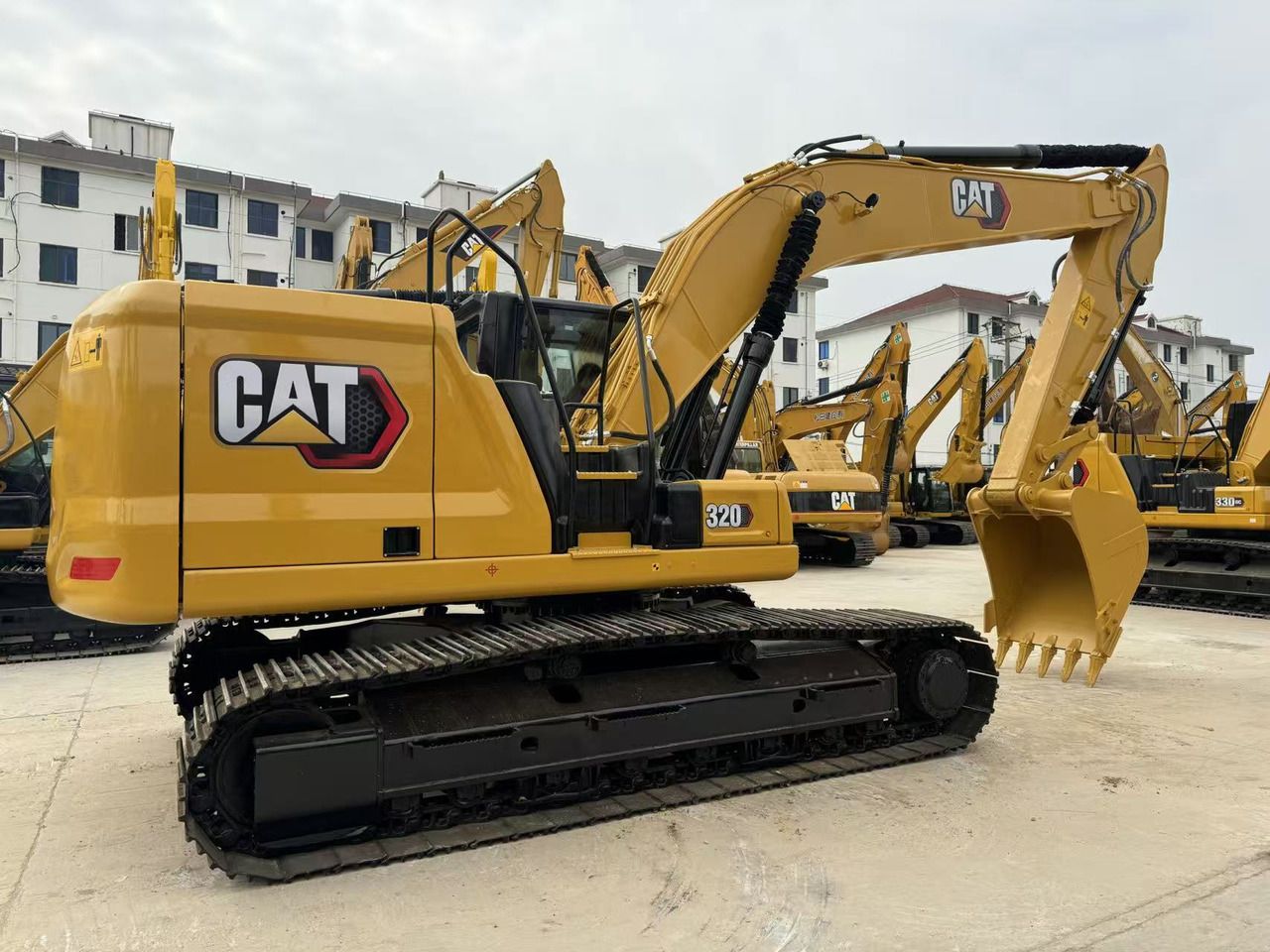 2024 Caterpillar 320 crawler excavator side view