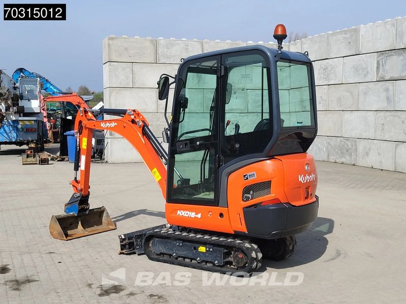 2023 Kubota KX016-4 mini excavator, rear three-quarter view 2023 Kubota KX016-4 mini excavator, rear three-quarter view