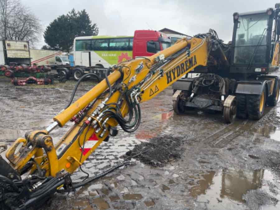 Hydrema MX16 RAIL wheel excavator, front three-quarter view