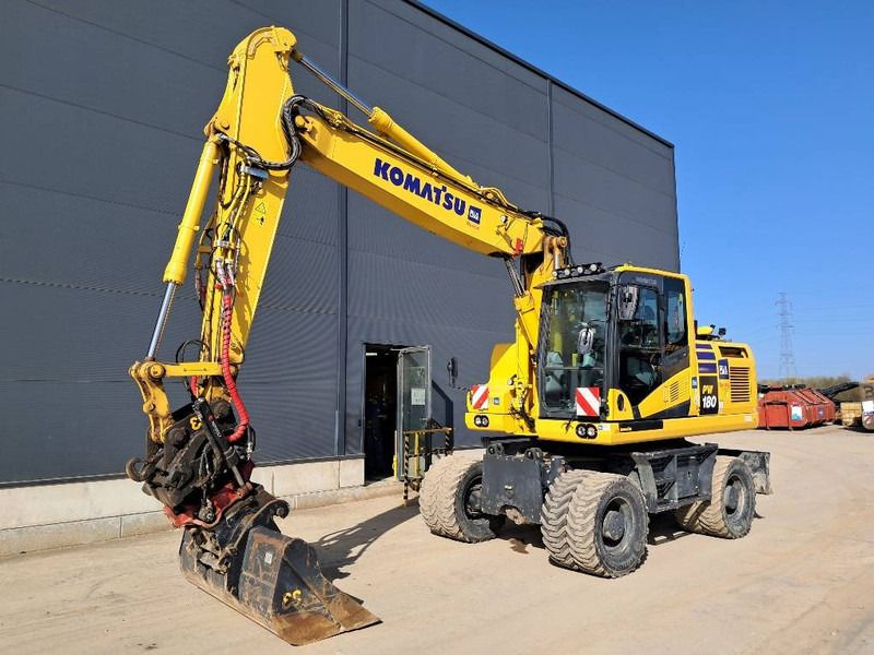 2023 Komatsu PW180-11E0 wheel excavator, side view 2023 Komatsu PW180-11E0 wheel excavator, side view