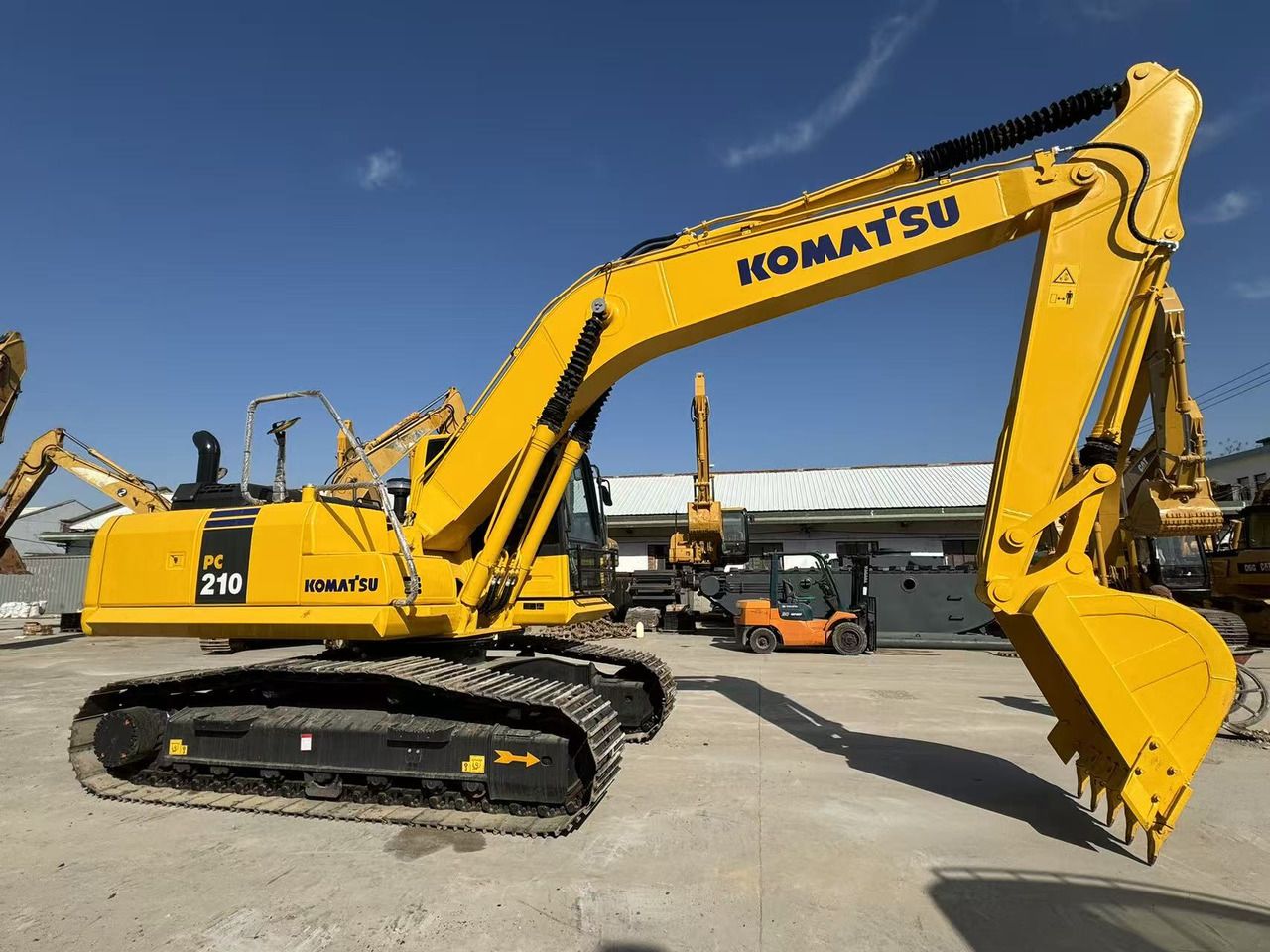 2023 Komatsu PC210-8 crawler excavator side view