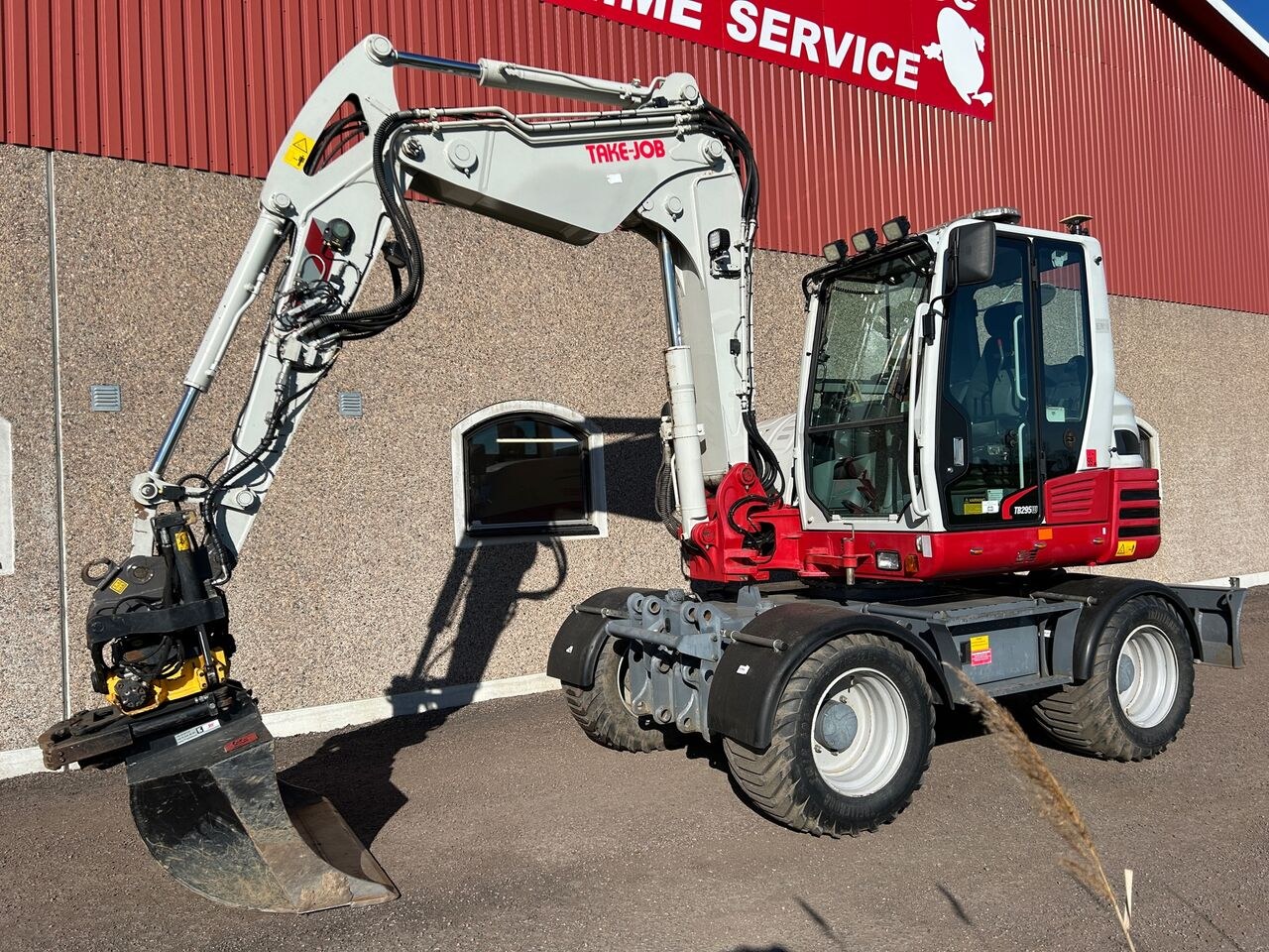 2017 Takeuchi TB295W wheel excavator side view