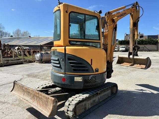 2011 Hyundai R27Z-9 mini excavator, rear three-quarter view 2011 Hyundai R27Z-9 mini excavator, rear three-quarter view