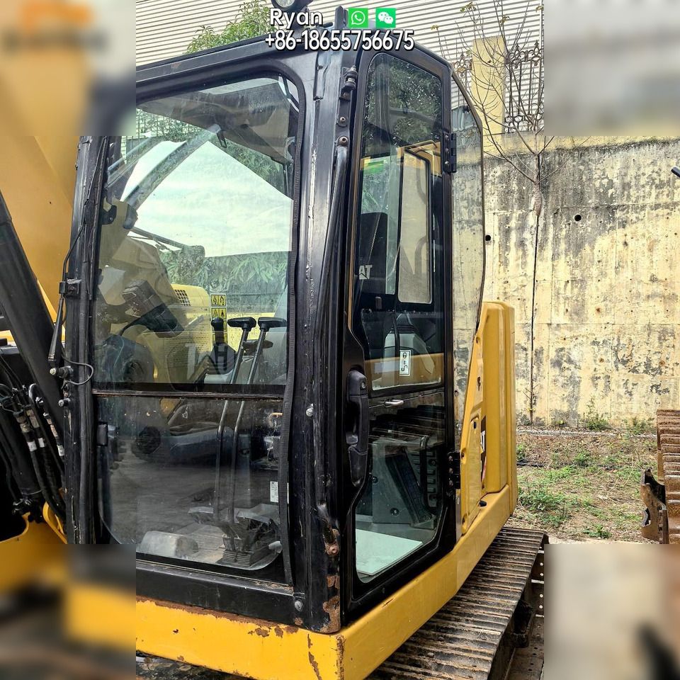2019 Caterpillar 310 crawler excavator cab view 2019 Caterpillar 310 crawler excavator cab view