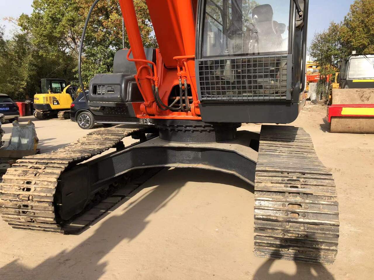 2013 Hitachi ZX240 crawler excavator, front view of undercarriage and cab 2013 Hitachi ZX240 crawler excavator, front view of undercarriage and cab