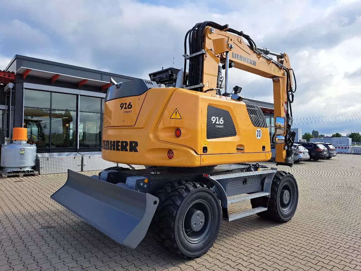 2023 Liebherr A916 Compact wheel excavator, rear three-quarter view