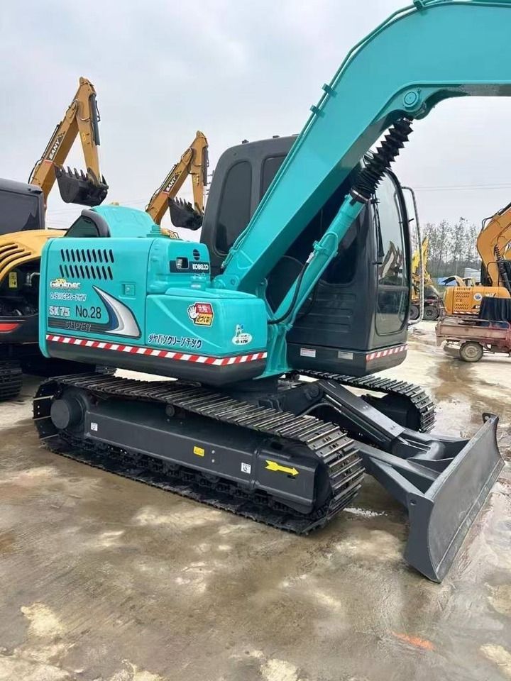 2025 Kobelco SK75 mini excavator, side profile view 2025 Kobelco SK75 mini excavator, side profile view