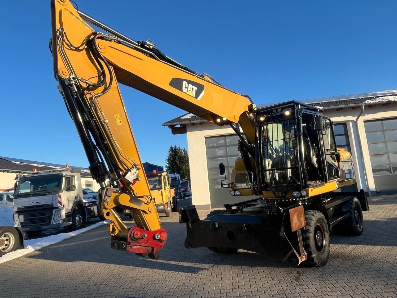 2013 Caterpillar M318D wheel excavator, front three-quarter view 2013 Caterpillar M318D wheel excavator, front three-quarter view