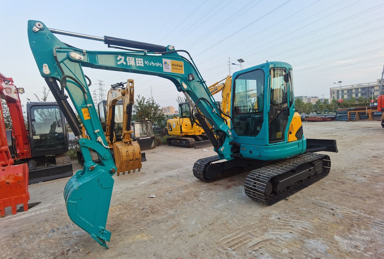 2022 Kubota KX155 mini excavator, side view 2022 Kubota KX155 mini excavator, side view
