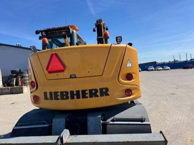 2016 Liebherr A910 COMPACT wheel excavator rear view 2016 Liebherr A910 COMPACT wheel excavator rear view