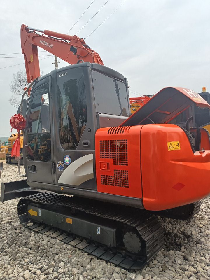 2023 Hitachi ZX60 mini excavator, rear three-quarter view 2023 Hitachi ZX60 mini excavator, rear three-quarter view