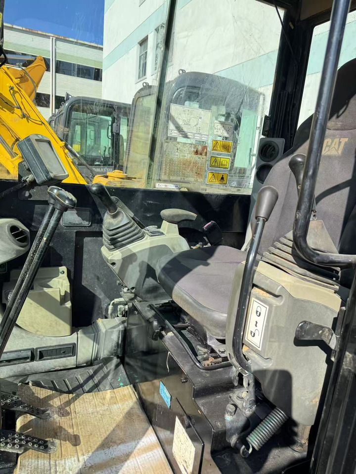 2020 Caterpillar 306E2 mini excavator interior cab view 2020 Caterpillar 306E2 mini excavator interior cab view