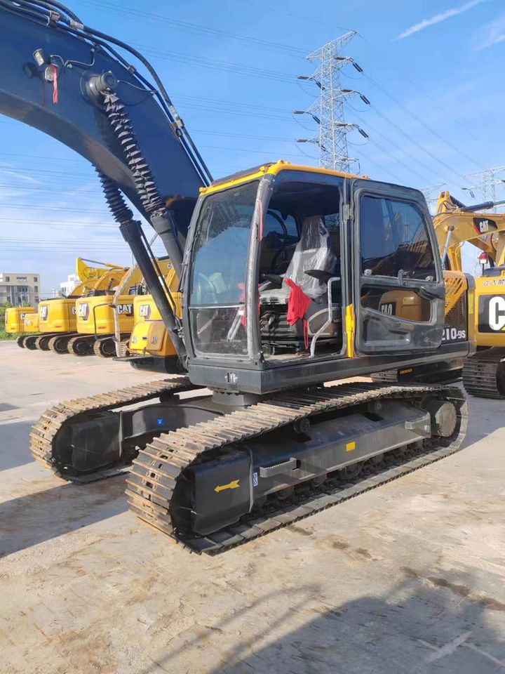 2024 Hyundai 210-9 crawler excavator, side view of the cab and tracks