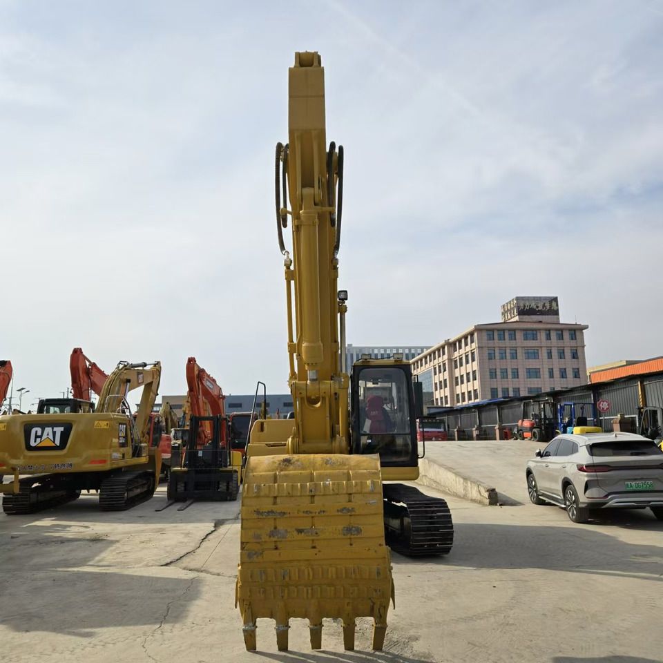 2020 Caterpillar 320BL crawler excavator, front view with boom raised 2020 Caterpillar 320BL crawler excavator, front view with boom raised