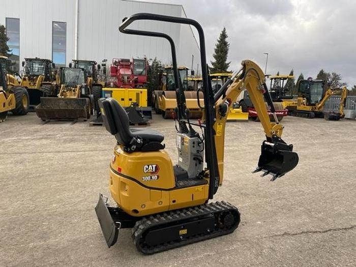 2021 Caterpillar 300.9D mini excavator, rear three-quarter view 2021 Caterpillar 300.9D mini excavator, rear three-quarter view