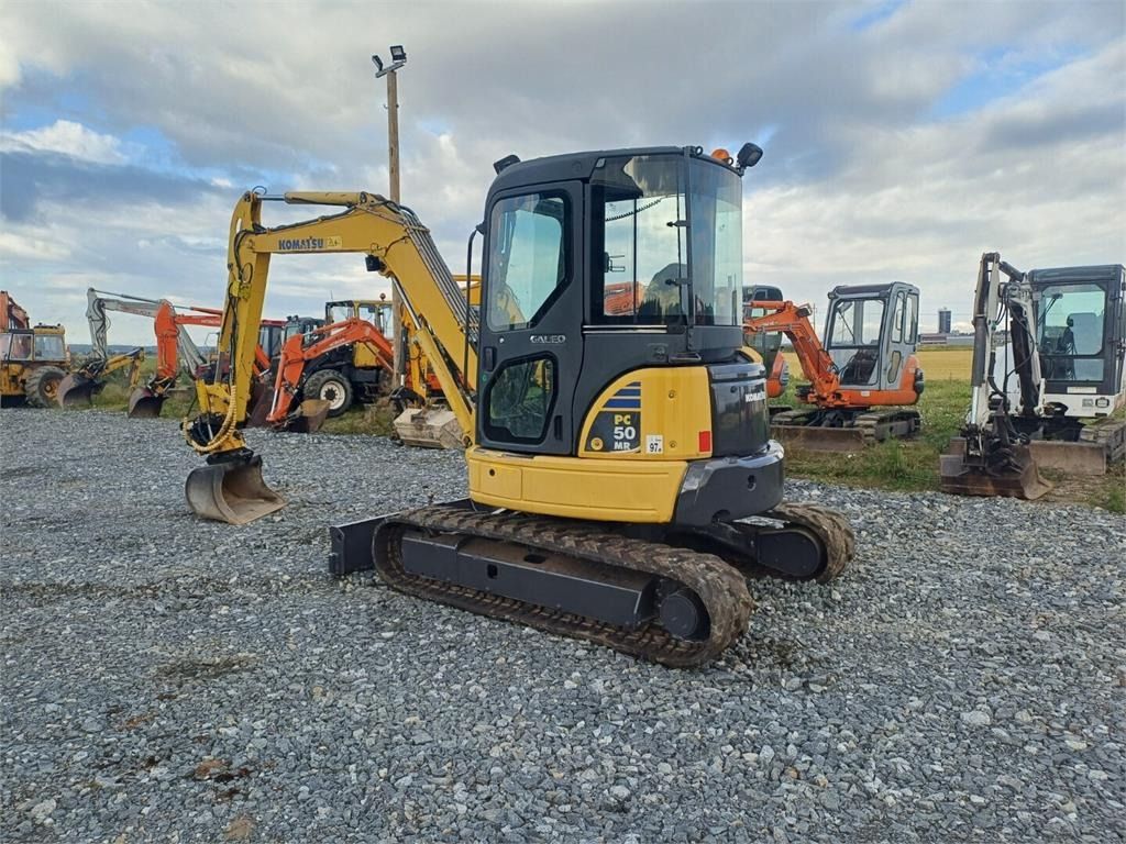 2005 Komatsu PC50MR-2 mini excavator, rear three-quarter view 2005 Komatsu PC50MR-2 mini excavator, rear three-quarter view