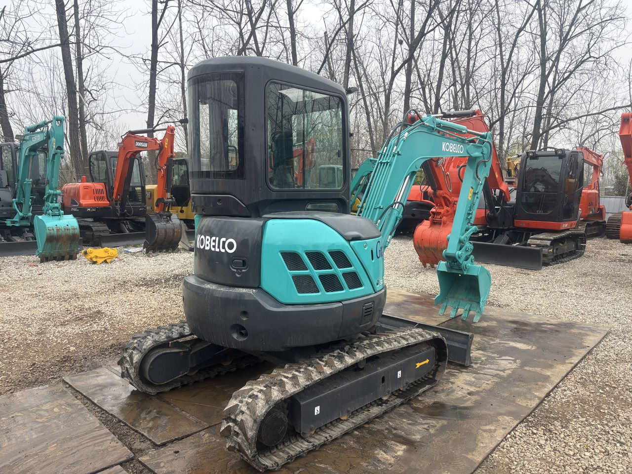2023 Kobelco SK35 mini excavator, rear three-quarter view