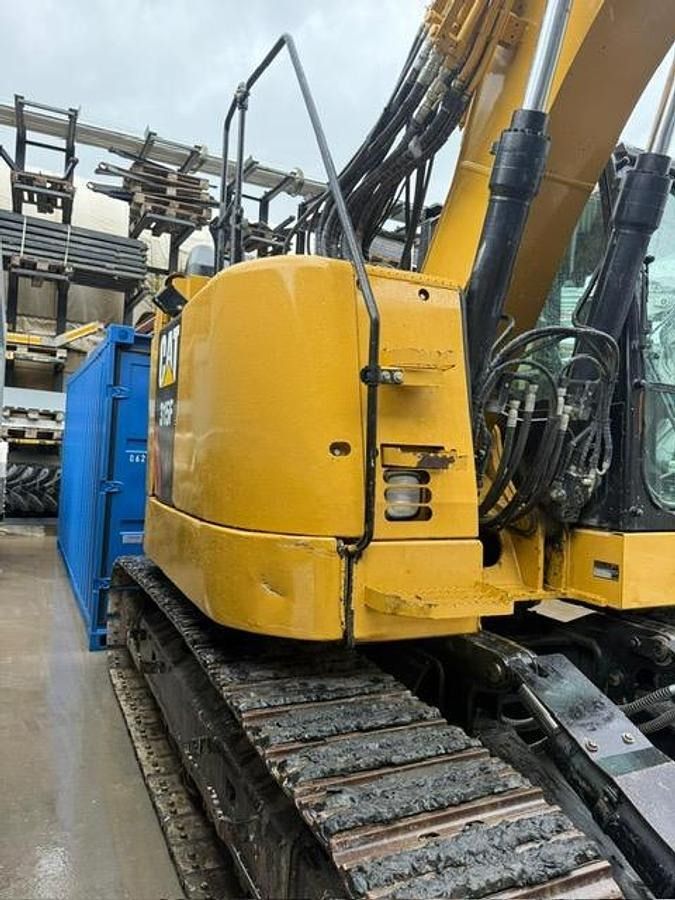 2016 Caterpillar 315F crawler excavator side view 2016 Caterpillar 315F crawler excavator side view