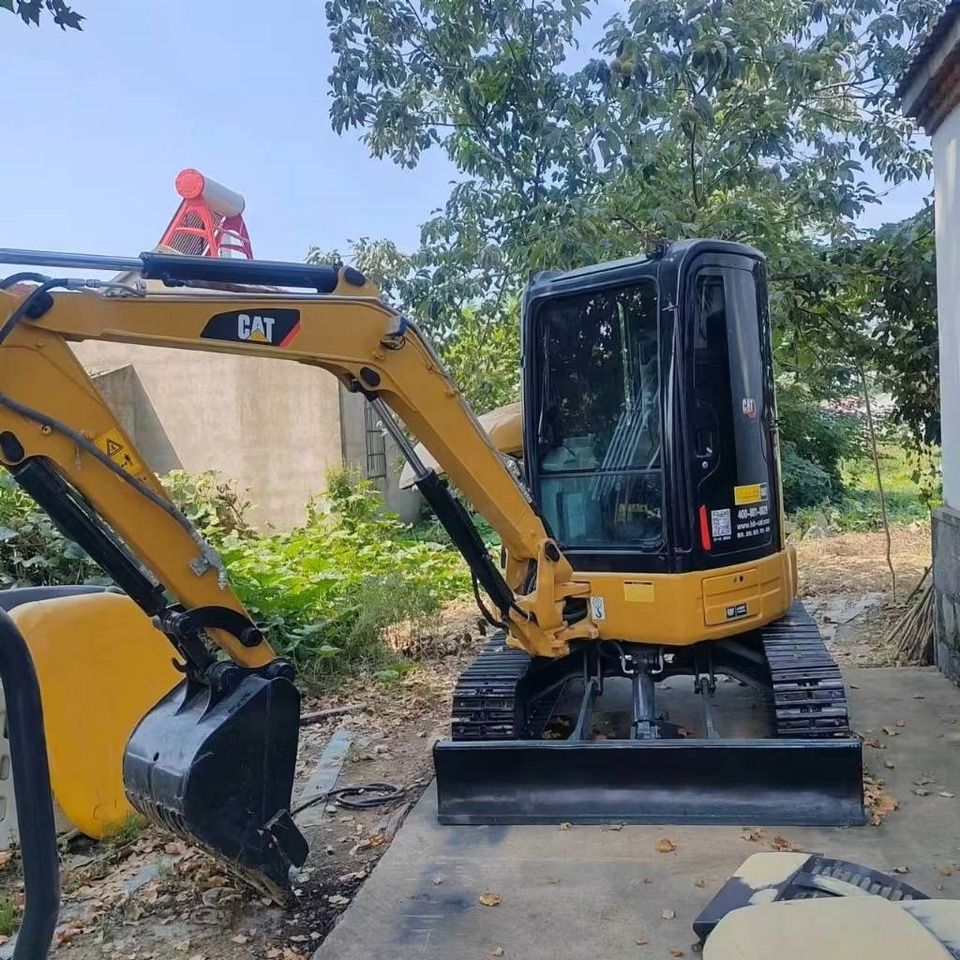 2022 Caterpillar 303.5ECR mini excavator, front three-quarter view 2022 Caterpillar 303.5ECR mini excavator, front three-quarter view
