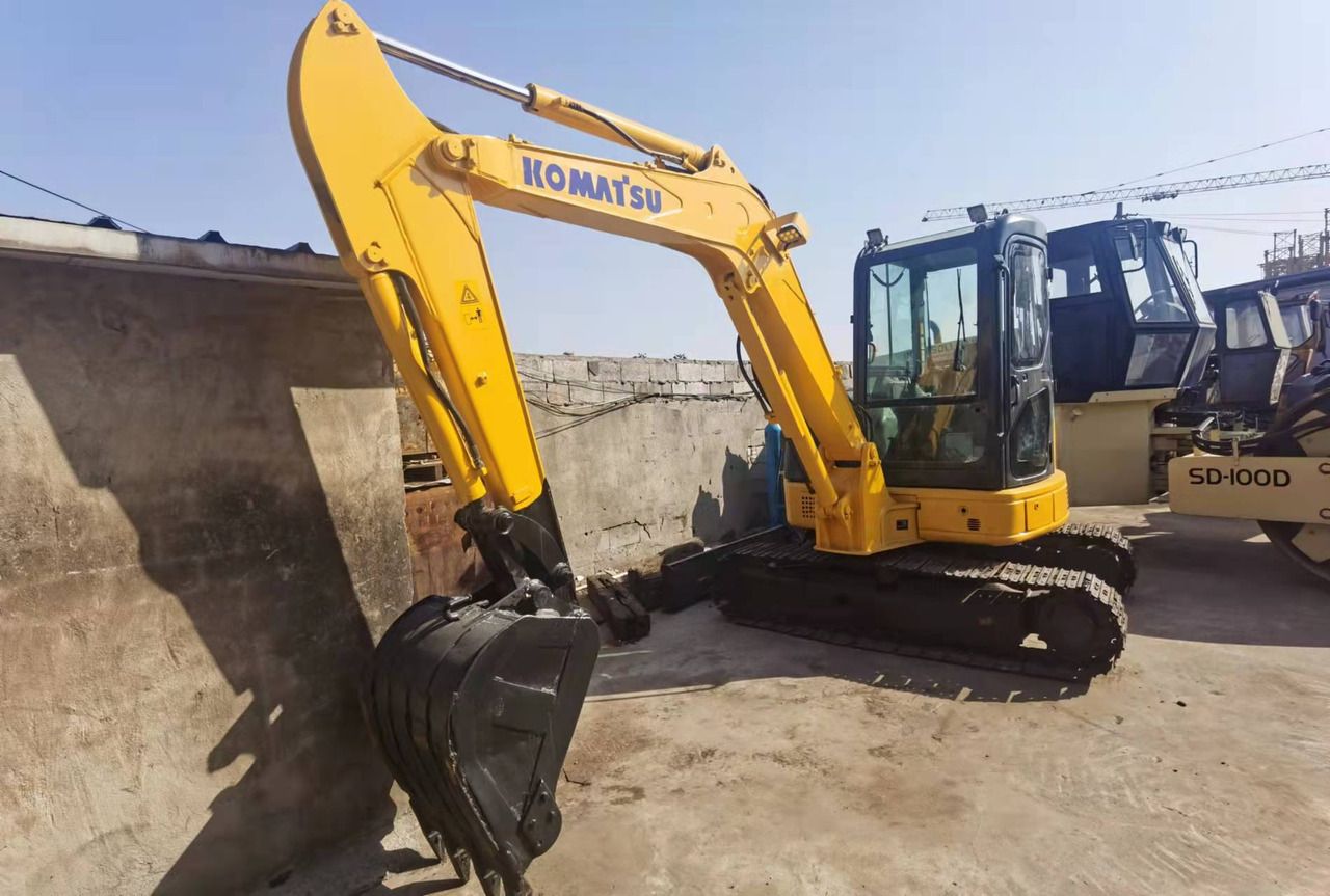 2018 Komatsu PC55MR-2 mini excavator, side view 2018 Komatsu PC55MR-2 mini excavator, side view