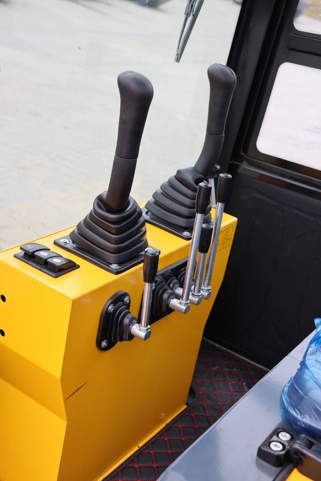 APS OKW12 mini excavator interior control levers APS OKW12 mini excavator interior control levers