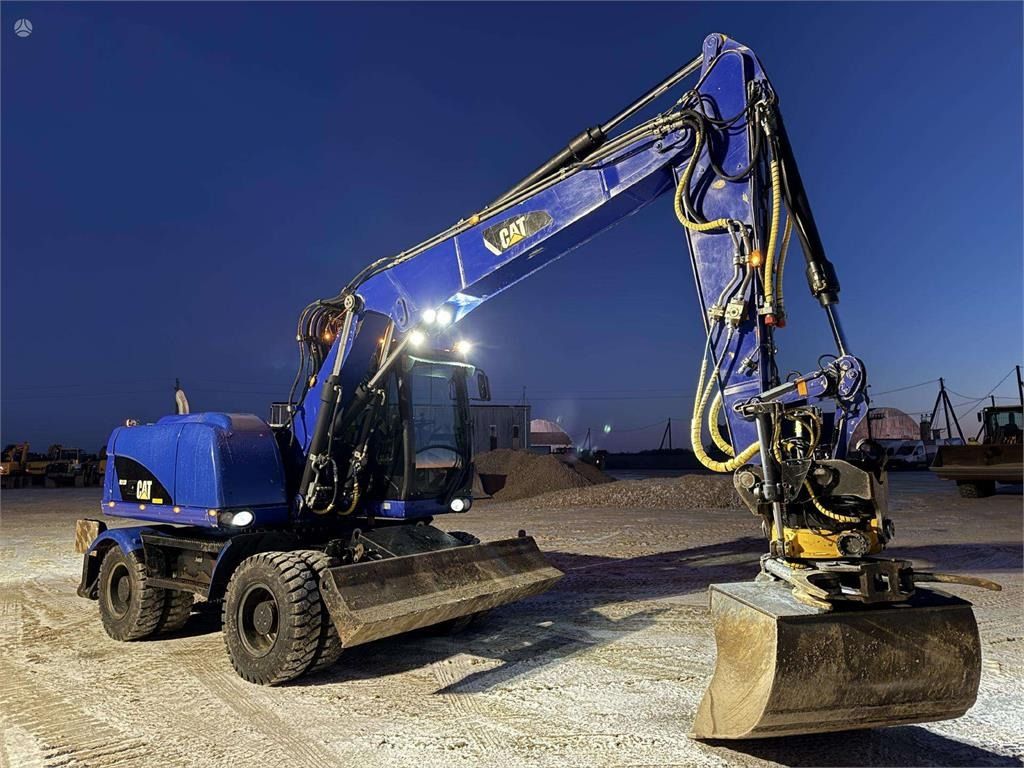 2014 Caterpillar M313D wheel excavator, side profile view 2014 Caterpillar M313D wheel excavator, side profile view