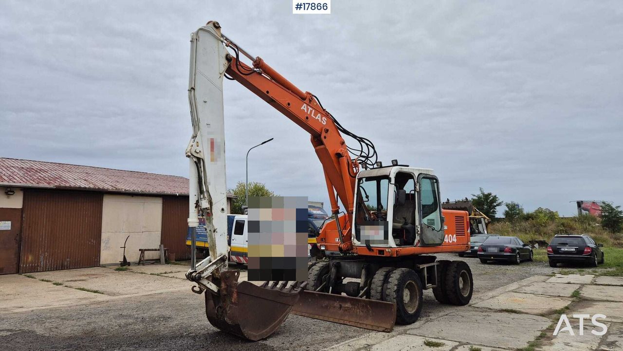 1995 Atlas 1404 wheel excavator, side view