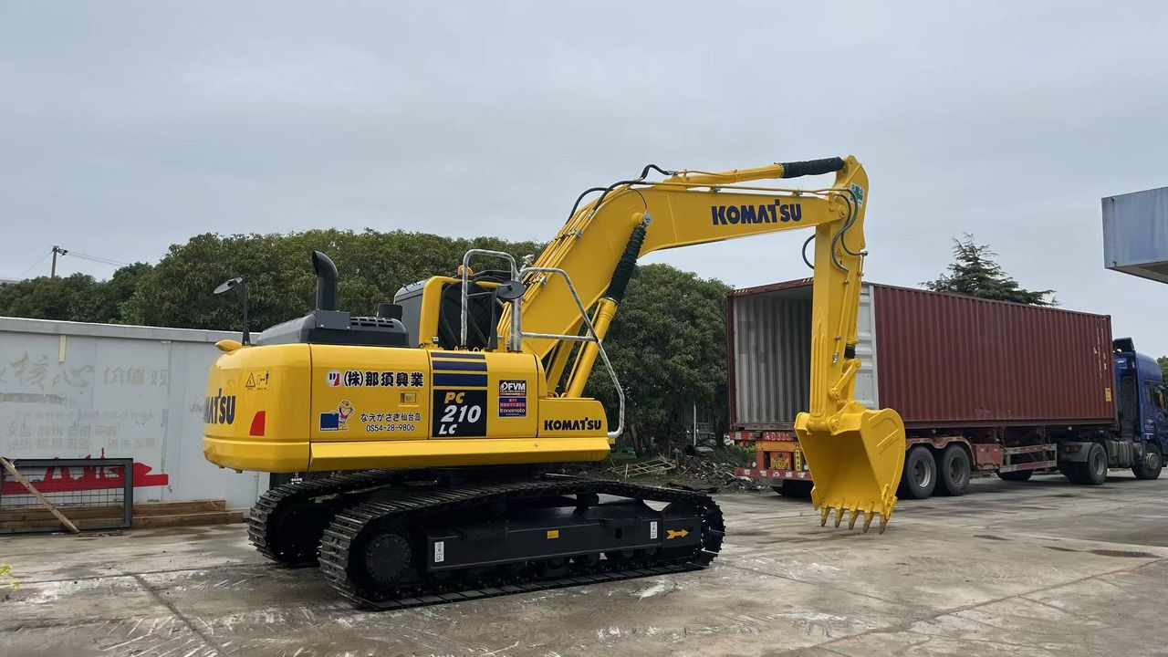 2023 Komatsu PC210LC crawler excavator, rear three-quarter view