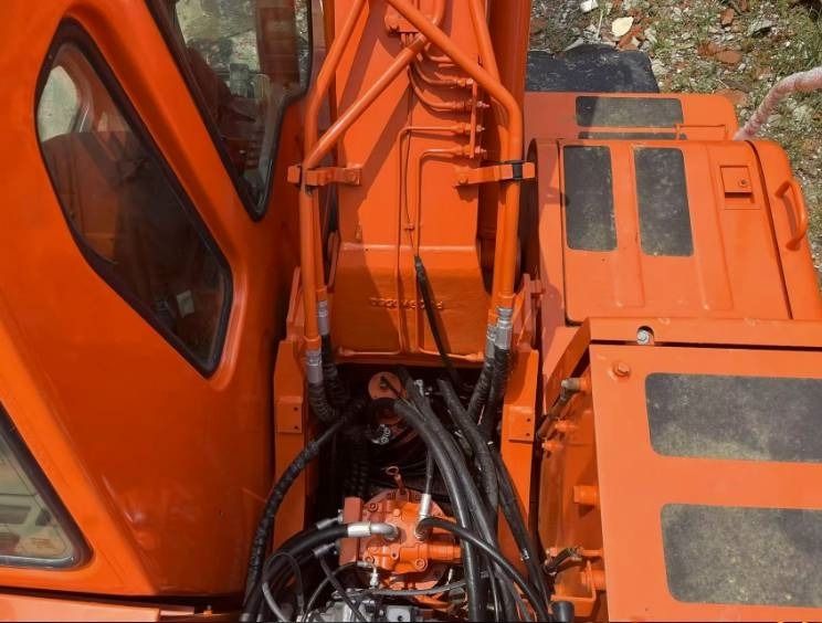 2022 Doosan DH150W-7 wheel excavator top-down view of cab and boom base